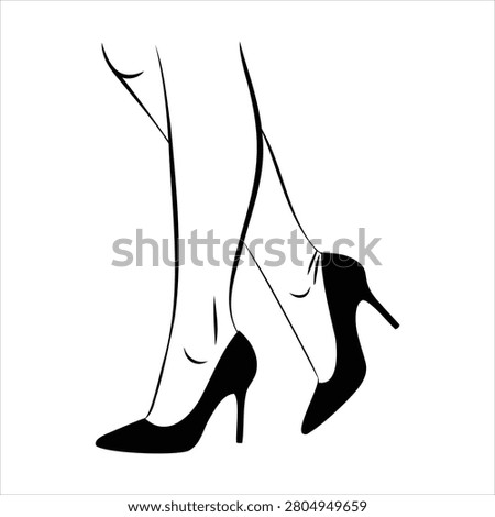 Womans legs wearing high heel shoes in elegant pose on white background