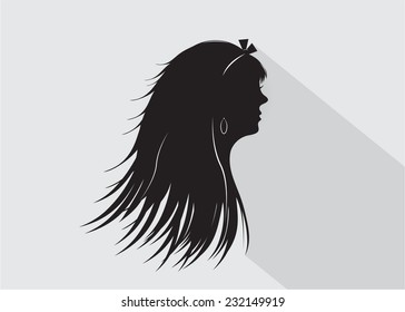 The woman's silhouette in a profile with long hair