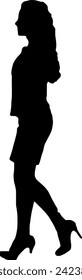 A woman's silhouette is walking to the left.