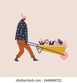 Women carries a garden wheelbarrow cart with flowers illustration in vector. Gardener or farmer female cartoon character working in the garden.