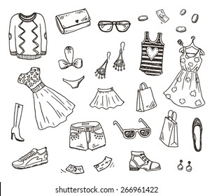 Women clothes and accessories, hand drawn doodle set