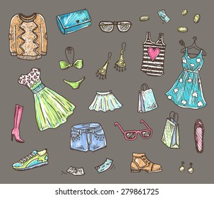 Women clothes and accessories, hand drawn doodle set