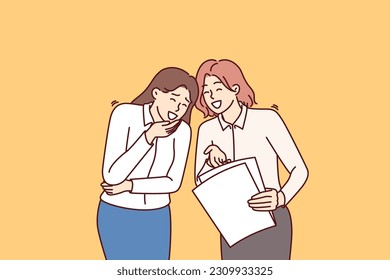 Women colleagues laugh at joke or funny story and share intimate gossip about company employees. Business women laugh when see stupid mistake in paper report made by inexperienced employee.