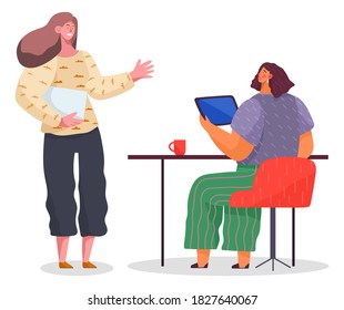 Women communicate at work. Workflow discussion of matters. Female characters business consultation. Girl with tablet pc in hands talking to a colleague. Meeting in office, development of plans