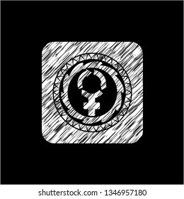 women cycle icon inside chalk emblem written on a blackboard