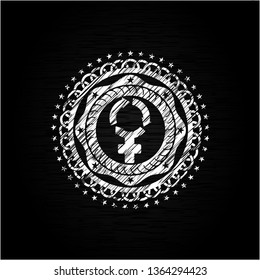 women cycle icon inside chalk emblem written on a blackboard