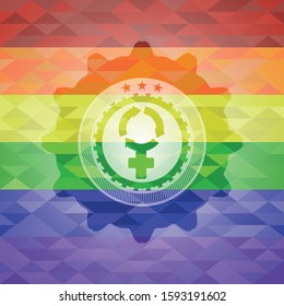 women cycle icon inside emblem on mosaic background with the colors of the LGBT flag