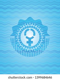 women cycle icon inside light blue water wave emblem.