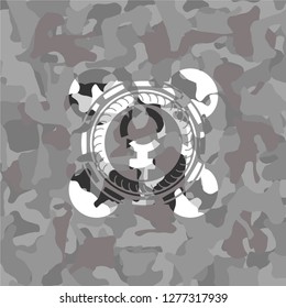 women cycle icon on grey camo pattern