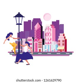 women dancing with the lamp city buildings