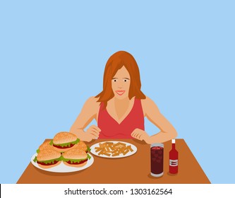 
Women are eating fast food on a brown wooden table.