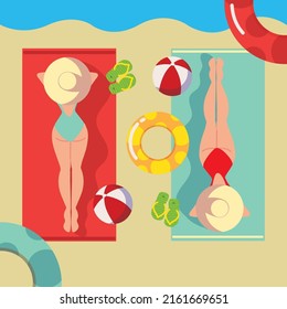 women in hat lying on towel, beach summer