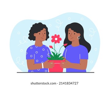 Women holding blooming plant. Girls looking at flower, love for nature, growing at home. Friend shows another her hobbies, gift. Daughter helps mom, household chores. Cartoon flat vector illustration