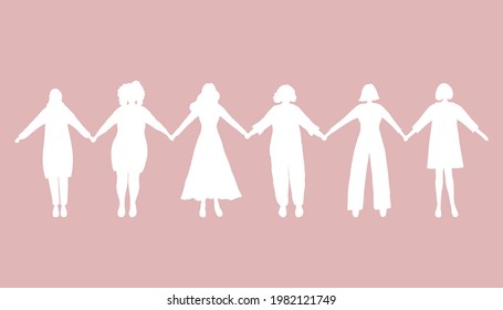 Women holding hands. White silhouettes of women on a pink background. Women's community. Female solidarity. International Women's Day concept. Silhouettes of Women of different races. Vector 