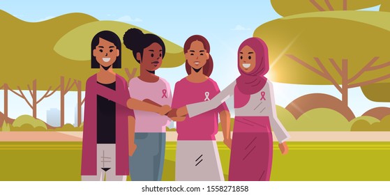 women with pink ribbons holding hands mix race girls standing together breast cancer day disease awareness and prevention concept summer park landscape background flat portrait horizontal vector