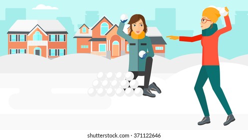 Women playing in snowballs.