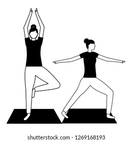 women practicing yoga on mat