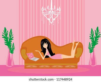 women purchasing product online using her laptop computer