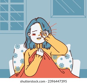 women rubbing her eyes on bed