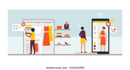 Women shopping for clothes and using new innovative technologies: augmented reality app on a smartphone and virtual fitting room on a touch screen digital display