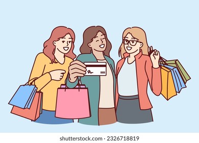 Women show off credit card for shopping and hold packages from boutiques after going to mall. Three happy girls recommend using banking for shopping with discounts or cashback on black friday