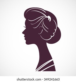 Women silhouette head with beautiful stylized hairstyle