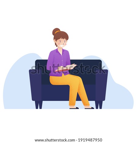 women sit on sofa with read a book