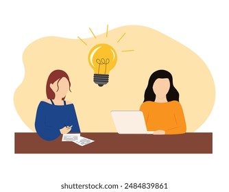 Women sit at the table and come up with ideas