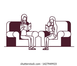 women sitting on chair with book in hands