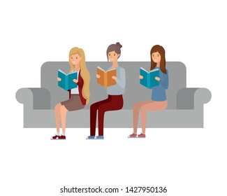 women sitting on chair with book in hands