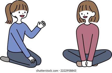 Women sitting on the floor and chatting