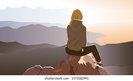 women sitting on the rock with sunset time infront of mountain