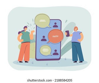 Women Standing Next To Huge Phone With Dialogue On Screen. People Chatting Using Smartphone Or Talking Via Mobile App Flat Vector Illustration. Online Communication, Conversation Concept For Banner