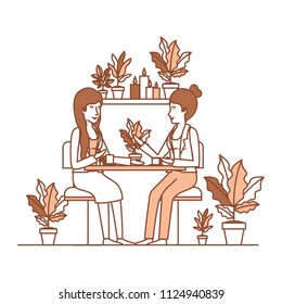 women in the table drinking coffee with house plants