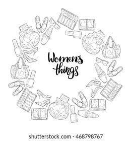 Women things: high heel shoes, ladies handbag, cosmetics, perfumes, sunglasses. Frame - wreath.
