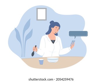 Women uses smart phone while eating in a cafe