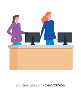 women working in desk with computer