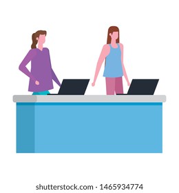 women working in desk with computer