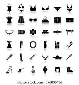 Women's accessories drop shadow black icons set. Clothes, cosmetics, jewelry, footwear and manicure equipment. Ladies fashion. Isolated vector illustrations