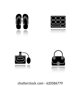 Women's accessories drop shadow black icons set. Flip flops, eye shadows, perfume, handbag. Isolated vector illustrations
