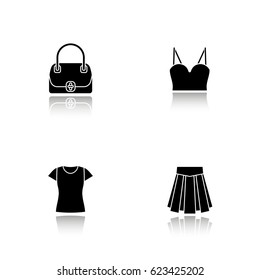Women's accessories drop shadow black icons set. Handbag, top, skirt, t-shirt. Isolated vector illustrations