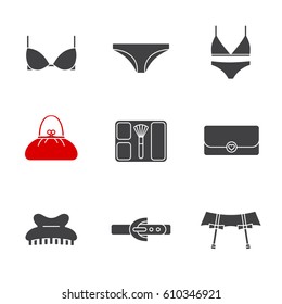 Women's accessories glyph icons set. Silhouette symbols. Underwear garters, bra and panties, clutch, purse, blusher, claw hair clip, leather belt. Vector isolated illustration