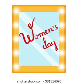 Womens day lettering on makeup mirror with lights.