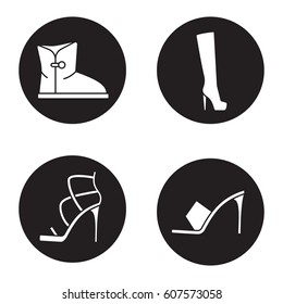 Women's footwear icons set. High heel shoes, warm winter and high autumn boots. Vector white silhouettes illustrations in black circles