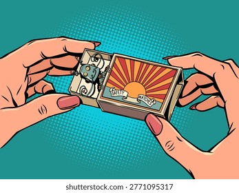 Women's hands hold matchbox