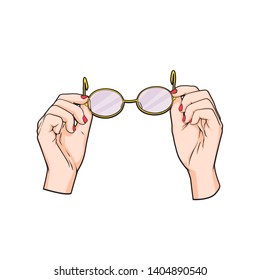 Womens hands holding eyeglasses, vector illustration isolated on white background