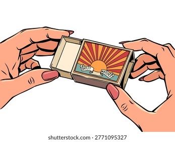 Women's hands holding matchbox