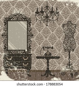 Women's room in vintage, boudoir style with mannequin, chandelier, mirror, table and telephone