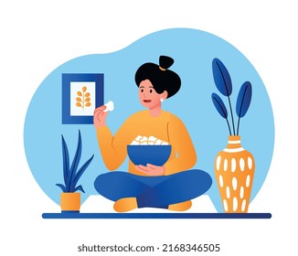 Wonan eating at home. Girl sits in lotus position with plate of popcorn. Rest after work and evening hobbies. Character watching movies and series in apartment. Cartoon flat vector illustration