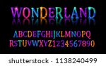 Wonderland font. Fairy ABC. Set of letters. Magical beast with long striped tail. Vector illustration